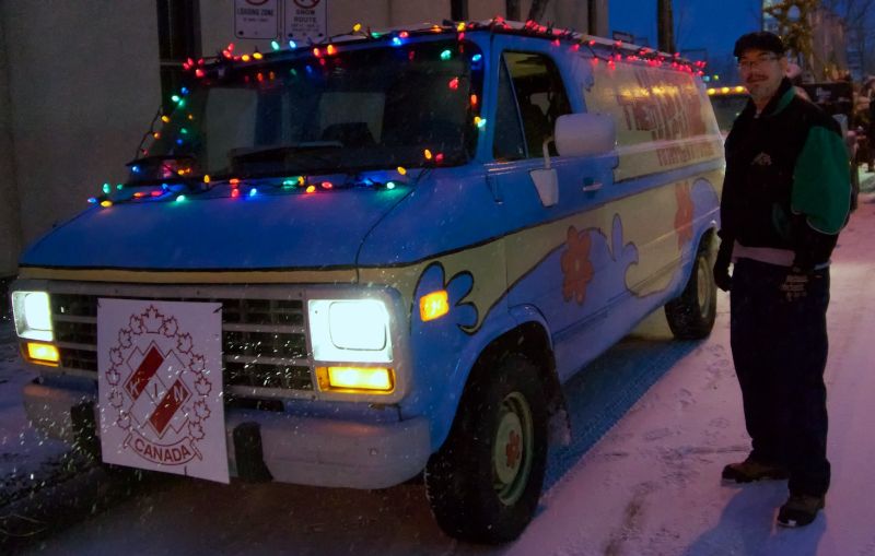 The "Mystery Machine" tribute van.  Pictured is the owner and driver, Chad Bicklmeier, Kinsmen member.